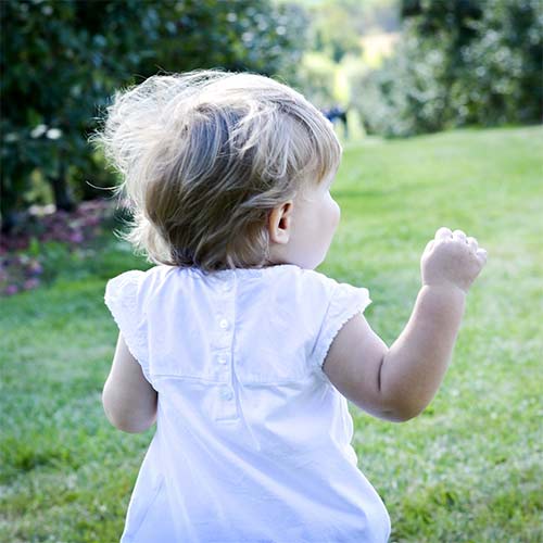 young child enjoying being outside