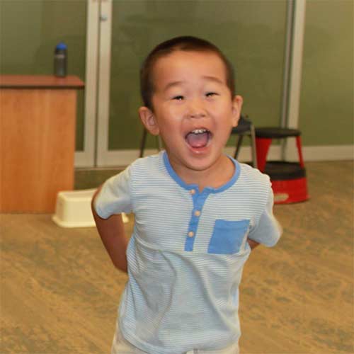 happy boy at the library